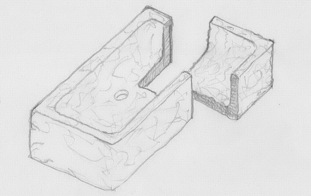 disegno con sezione di un lavabo in marmo a massello